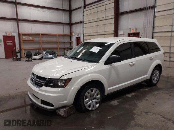 2015 Dodge Journey American Value z VIN 3C4PDCAB4FT714200, wystawiony jako IAAI lot #42199910 z przebiegiem 205 009 mil mil oraz . Historia ofert i sprzedaży dostępna na DreamBid. Obrazek 2.