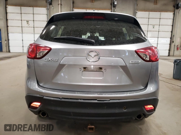 2013 Mazda CX-5 Sport z VIN JM3KE2BE4D0137115, wystawiony jako Copart lot #54487795 z przebiegiem 154 111 mil mil oraz Szkoda całkowita • Salvage title. Historia ofert i sprzedaży dostępna na DreamBid. Obrazek 6.