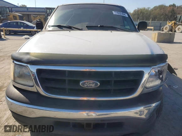 2000 Ford F-150 XL with VIN 1FTRX18W2YNC34320, listed as a Copart auction lot 77832404 with 217,448 mi miles and Clean Title. Bid and sale history available at carsss.com. Image 5.