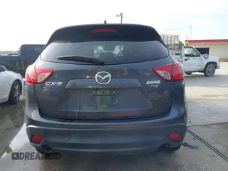 2014 Mazda CX-5 Grand Touring with VIN JM3KE2DY7E0345742, listed as a IAAI auction lot 41864116 with 158,746 mi miles. Bid and sale history available at carsss.com. Image 16.