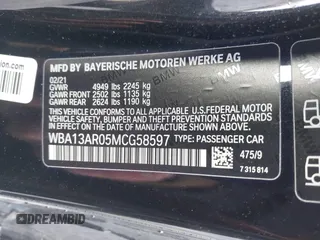 2021 BMW 4 Series M440i xDrive with VIN WBA13AR05MCG58597, listed as a IAAI auction lot 41475262 with 42,626 mi miles and . Bid and sale history available at DreamBid. Image 9.