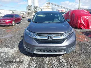 2018 Honda CR-V LX z VIN 2HKRW6H34JH202657, wystawiony jako IAAI lot #41568088 z przebiegiem Nie podano mil oraz . Historia ofert i sprzedaży dostępna na DreamBid. Obrazek 11.
