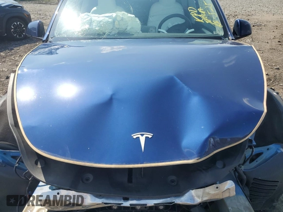 2024 Tesla Model Y Long Range with VIN 7SAYGAEEXRF983702, listed as a Copart auction lot 61536565 with Not provided miles and Salvage title. Bid and sale history available at DreamBid. Image 12.