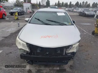 2012 Toyota Camry L with VIN 4T1BF1FK8CU513544, listed as a IAAI auction lot 41919094 with 136,912 mi miles and . Bid and sale history available at DreamBid. Image 6.