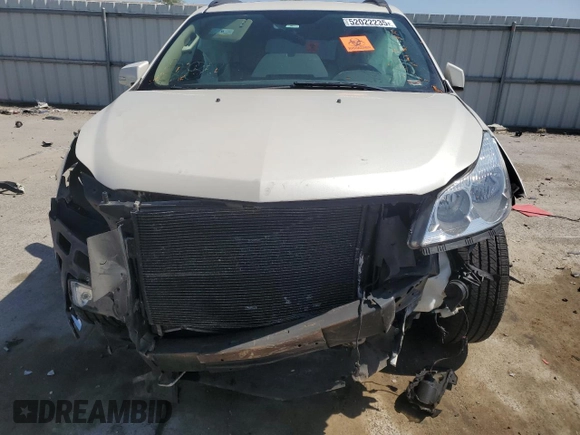 2012 Chevrolet Traverse LTZ z VIN 1GNKVLED1CJ170106, wystawiony jako Copart lot #52022235 z przebiegiem Nie podano mil oraz Szkoda całkowita • Salvage title. Historia ofert i sprzedaży dostępna na DreamBid. Obrazek 13.