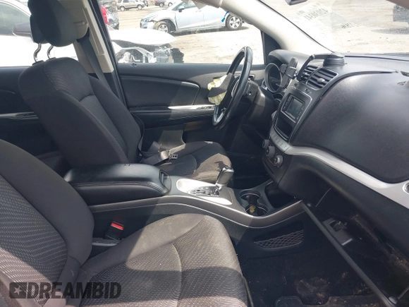 2014 Dodge Journey SE with VIN 3C4PDCABXET219532, listed as a IAAI auction lot 42030341 with 139,145 mi miles and . Bid and sale history available at carsss.com. Image 5.