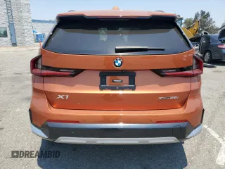 2023 BMW X1 xDrive28i with VIN WBX73EF03P5W54209, listed as a Copart auction lot 64796365 with 19,591 mi miles and Salvage title. Bid and sale history available at DreamBid. Image 6.