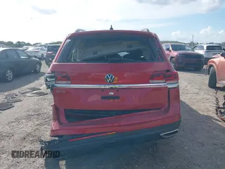 2021 Volkswagen Atlas SE z VIN 1V2WR2CA3MC526612, wystawiony jako IAAI lot #41625077 z przebiegiem 70 856 mil mil oraz . Historia ofert i sprzedaży dostępna na DreamBid. Obrazek 16.