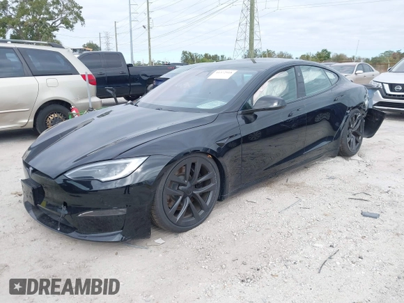 2023 Tesla Model S with VIN 5YJSA1E52PF500088, listed as a IAAI auction lot 41372918 with Not provided miles and . Bid and sale history available at DreamBid. Image 18.