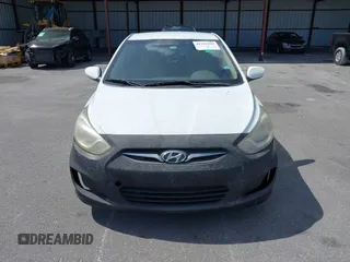 2014 Hyundai Accent GLS with VIN KMHCT4AE1EU590386, listed as a IAAI auction lot 42155202 with 248,545 mi miles. Bid and sale history available at carsss.com. Image 6.