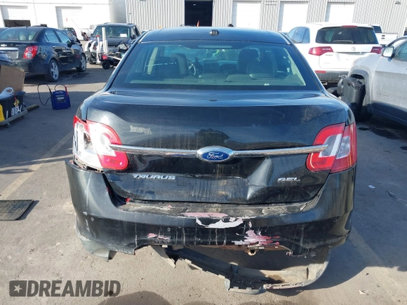 2012 Ford Taurus SEL z VIN 1FAHP2EW3CG128208, wystawiony jako IAAI lot #41020348 z przebiegiem 161 794 mil mil oraz . Historia ofert i sprzedaży dostępna na DreamBid. Obrazek 16.