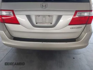 2005 Honda Odyssey EX-L with VIN 5FNRL38705B106488, listed as a IAAI auction lot 42545141 with 199,619 mi miles and . Bid and sale history available at DreamBid. Image 16.