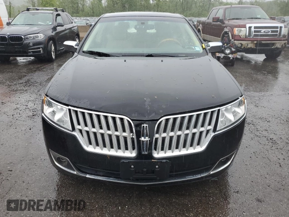 2012 Lincoln MKZ z VIN 3LNHL2GC3CR807053, wystawiony jako Copart lot #56425195 z przebiegiem 114 669 mil mil oraz Czysty tytuł • Clean title. Historia ofert i sprzedaży dostępna na DreamBid. Obrazek 5.