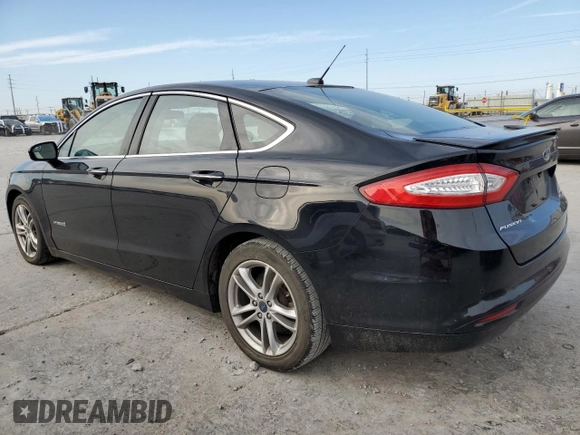 2016 Ford Fusion Titanium Hybrid with VIN 3FA6P0RU2GR203760, listed as a Copart auction lot 81682234 with 142,313 mi miles and Salvage Title. Bid and sale history available at carsss.com. Image 2.