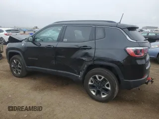2018 Jeep Compass Trailhawk with VIN 3C4NJDDB6JT207289, listed as a Copart auction lot 56013675 with 83,385 mi miles and Salvage title. Bid and sale history available at DreamBid. Image 2.
