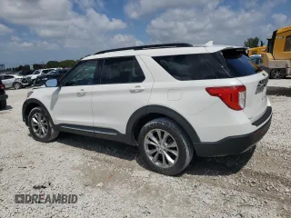 2022 Ford Explorer XLT with VIN 1FMSK8DH0NGB18321, listed as a Copart auction lot 50718605 with 21,047 mi miles and Salvage Title. Bid and sale history available at DreamBid. Image 2.