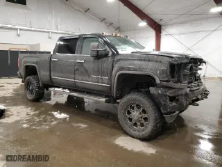 2015 GMC Sierra 2500HD Denali with VIN 1GT120E84FF194549, listed as a Copart auction lot 43583425 with 214,773 mi miles and Salvage Title. Bid and sale history available at carsss.com. Image 4.