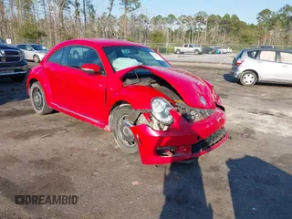 2013 Volkswagen Beetle Fender Edition with VIN 3VWJP7AT8DM674981, listed as a IAAI auction lot 41685176 with 65,283 mi miles and . Bid and sale history available at DreamBid. Image 1.