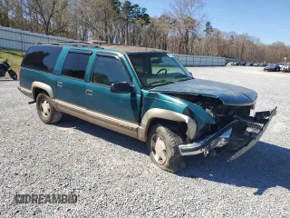 1997 GMC Suburban z VIN 1GKFK16R0VJ749323, wystawiony jako Copart lot #50222125 z przebiegiem 209 355 mil mil oraz Szkody całkowita. Historia ofert i sprzedaży dostępna na DreamBid. Obrazek 4.