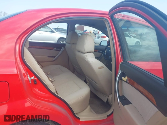 2011 Chevrolet Aveo 1LT with VIN KL1TD5DE1BB144692, listed as a IAAI auction lot 41908565 with 104,691 mi miles and . Bid and sale history available at DreamBid. Image 8.