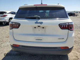 2020 Jeep Compass Latitude z VIN 3C4NJCBB2LT162755, wystawiony jako Copart lot #57730165 z przebiegiem 51 153 mil mil oraz Szkoda całkowita • Salvage title. Historia ofert i sprzedaży dostępna na DreamBid. Obrazek 6.