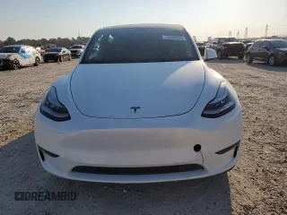 2023 Tesla Model Y Long Range z VIN 7SAYGDEE8PA069248, wystawiony jako Copart lot #74120944 z przebiegiem 17 085 mil mil oraz Szkoda całkowita • Salvage title. Historia ofert i sprzedaży dostępna na DreamBid. Obrazek 5.