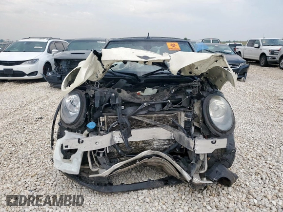 2017 MINI Convertible Cooper z VIN WMWWG5C32H3C20341, wystawiony jako Copart lot #57039685 z przebiegiem 100 575 mil mil oraz Szkoda całkowita • Salvage title. Historia ofert i sprzedaży dostępna na DreamBid. Obrazek 5.