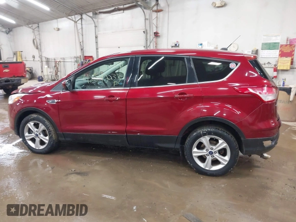 2013 Ford Escape SE with VIN 1FMCU9GX1DUC56361, listed as a IAAI auction lot 42042233 with 136,441 mi miles and . Bid and sale history available at DreamBid. Image 14.
