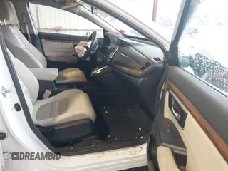 2019 Honda CR-V EX with VIN 2HKRW2H56KH641449, listed as a IAAI auction lot 41762860 with 181,557 mi miles and . Bid and sale history available at DreamBid. Image 5.