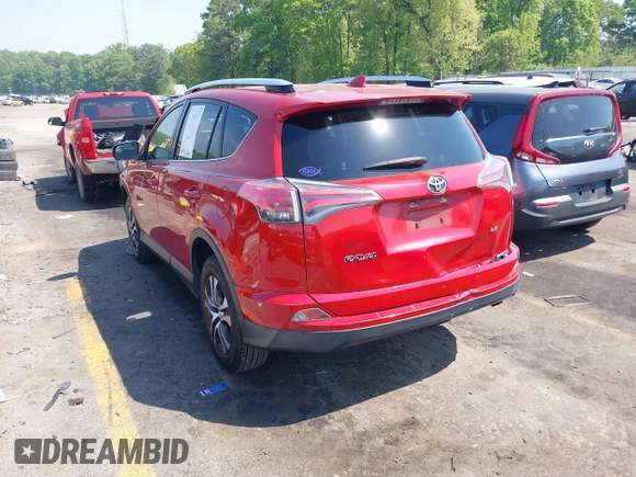 2016 Toyota RAV4 LE with VIN JTMZFREV1GJ098247, listed as a IAAI auction lot 42065800 with 199,172 mi miles and . Bid and sale history available at DreamBid. Image 3.