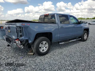 2015 Chevrolet Silverado 1500 LT with VIN 3GCUKREC8FG284565, listed as a Copart auction lot 52760805 with 128,501 mi miles and Salvage Title. Bid and sale history available at DreamBid. Image 3.