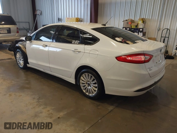2013 Ford Fusion SE Hybrid with VIN 3FA6P0LU5DR303873, listed as a IAAI auction lot 41074370 with 193,372 mi miles and . Bid and sale history available at DreamBid. Image 3.