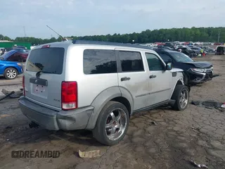 2007 Dodge Nitro SXT with VIN 1D8GU28K37W562598, listed as a IAAI auction lot 42491176 with 202,676 mi miles and . Bid and sale history available at DreamBid. Image 4.