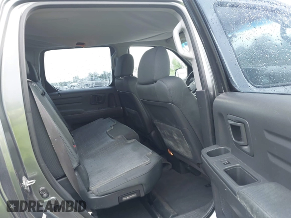 2009 Honda Ridgeline RT with VIN 5FPYK162X9B100513, listed as a IAAI auction lot 42683432 with 204,260 mi miles and . Bid and sale history available at DreamBid. Image 8.