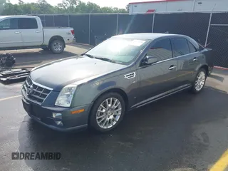2009 Cadillac STS AWD w/1SB with VIN 1G6DD67V090151883, listed as a IAAI auction lot 42075438 with 97,408 mi miles. Bid and sale history available at carsss.com. Image 18.