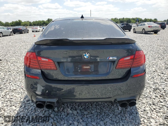 2016 BMW M5 z VIN WBSFV9C58GD595621, wystawiony jako Copart lot #54218185 z przebiegiem Nie podano mil oraz Czysty tytuł • Clean title. Historia ofert i sprzedaży dostępna na DreamBid. Obrazek 6.