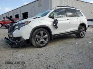 2021 Honda Passport Touring z VIN 5FNYF7H94MB003097, wystawiony jako Copart lot #77351474 z przebiegiem Nie podano mil oraz Nie do naprawy • Non repairable. Historia ofert i sprzedaży dostępna na DreamBid. Obrazek 1.