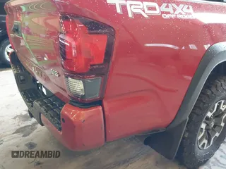 2019 Toyota Tacoma SR z VIN 3TMCZ5AN5KM220079, wystawiony jako IAAI lot #41856695 z przebiegiem 51 918 mil mil oraz . Historia ofert i sprzedaży dostępna na DreamBid. Obrazek 17.