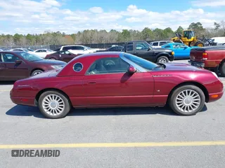 2004 Ford Thunderbird Deluxe with VIN 1FAHP60A64Y105598, listed as a IAAI auction lot 41806334 with 18,583 mi miles and . Bid and sale history available at DreamBid. Image 13.