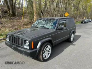 1997 Jeep Cherokee with VIN 1J4FT67S6VL571732, listed as a Copart auction lot 56349005 with 153,146 mi miles and Clean title. Bid and sale history available at DreamBid. Image 2.