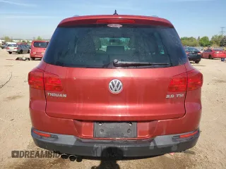 2014 Volkswagen Tiguan SE with VIN WVGAV3AX9EW038118, listed as a Copart auction lot 56329625 with 134,620 mi miles and Salvage title. Bid and sale history available at DreamBid. Image 6.