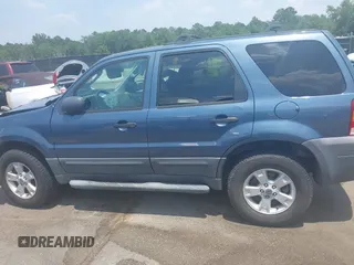2006 Ford Escape XLT z VIN 1FMCU93156KB10612, wystawiony jako IAAI lot #42583417 z przebiegiem 133 615 mil mil oraz . Historia ofert i sprzedaży dostępna na DreamBid. Obrazek 14.
