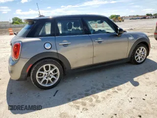 2018 MINI Hardtop 4 Door Cooper S with VIN WMWXU3C50J2F50669, listed as a Copart auction lot 55924355 with 64,702 mi miles and Salvage title. Bid and sale history available at DreamBid. Image 3.