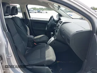 2008 Dodge Caliber SE with VIN 1B3HB28B98D757953, listed as a IAAI auction lot 42111663 with 115,977 mi miles. Bid and sale history available at carsss.com. Image 5.