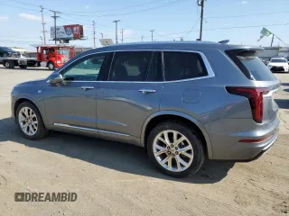 2020 Cadillac XT6 FWD Premium Luxury with VIN 1GYKPCRS5LZ201302, listed as a Copart auction lot 55103225 with 61,527 mi miles and Salvage Title. Bid and sale history available at carsss.com. Image 2.