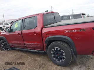 2023 Nissan Frontier Pro-4X z VIN 1N6ED1EK4PN652544, wystawiony jako IAAI lot #41309698 z przebiegiem 26 173 mil mil oraz . Historia ofert i sprzedaży dostępna na DreamBid. Obrazek 14.