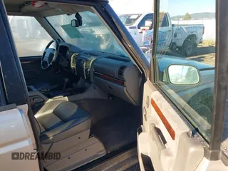 2000 Land Rover Discovery Cloth with VIN SALTY124XYA265857, listed as a IAAI auction lot 40807405 with 130,336 mi miles and . Bid and sale history available at DreamBid. Image 5.