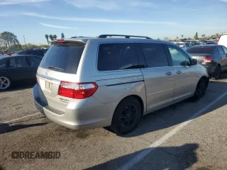 2005 Honda Odyssey TOURING with VIN 5FNRL38865B009529, listed as a Copart auction lot 50259815 with 198,999 mi miles and Salvage Title. Bid and sale history available at carsss.com. Image 3.