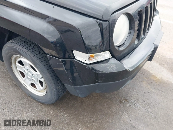 2014 Jeep Patriot Sport with VIN 1C4NJRBB4ED534026, listed as a IAAI auction lot 41850049 with 178,989 mi miles. Bid and sale history available at carsss.com. Image 6.