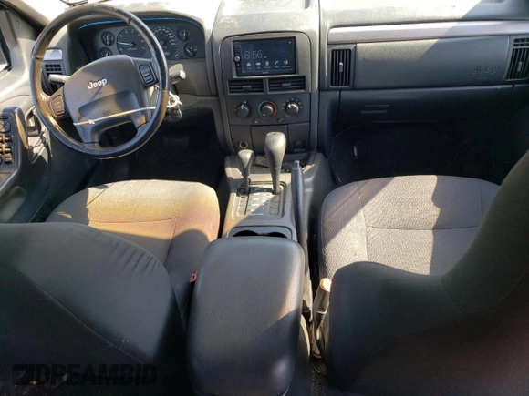 2002 Jeep Grand Cherokee Laredo с VIN 1J8GW48S22C206165, выставлен на аукционе Copart как лот 62193315 с пробегом 186 544 миль миль и Чистый • Clean title. История ставок и продаж доступна на DreamBid. Изображение 8.